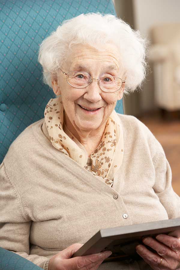 Elderly grandmother who is cared for in her own home.